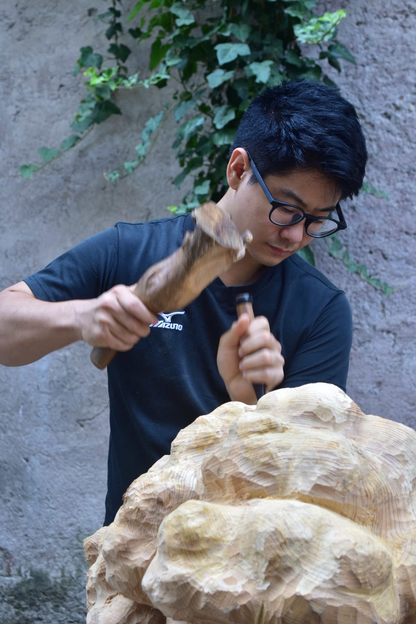 Artist's photo while modeling the wood